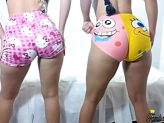 Horny Brunette Takes Two Tiny Dicks Deep In Her Mouth